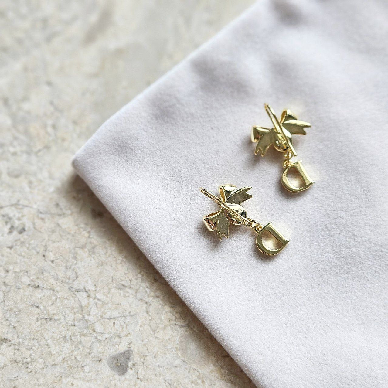 Dior Bow Gold Rhinestone Earrings