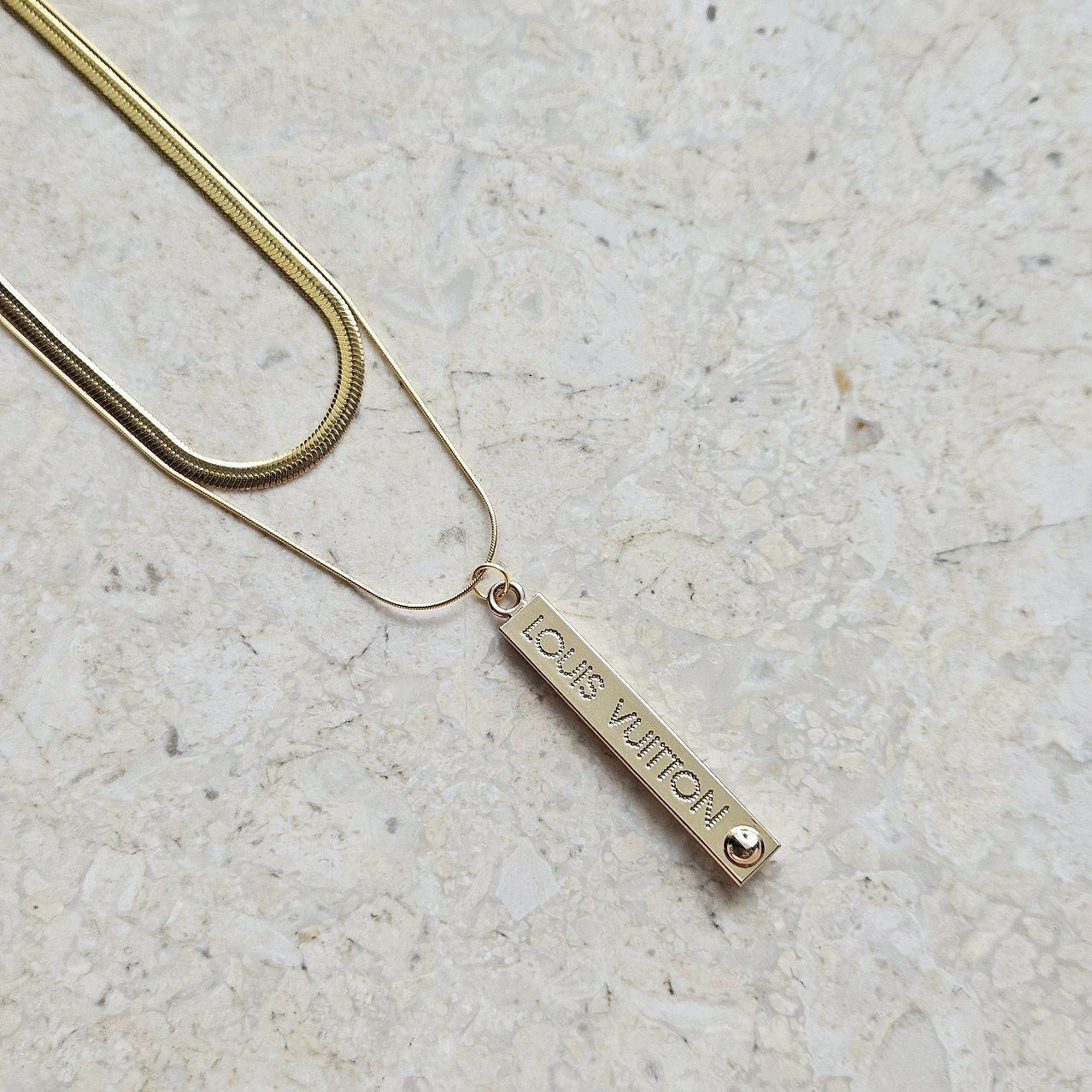 LV Gold Spellout Tag Necklace (Redesigned)
