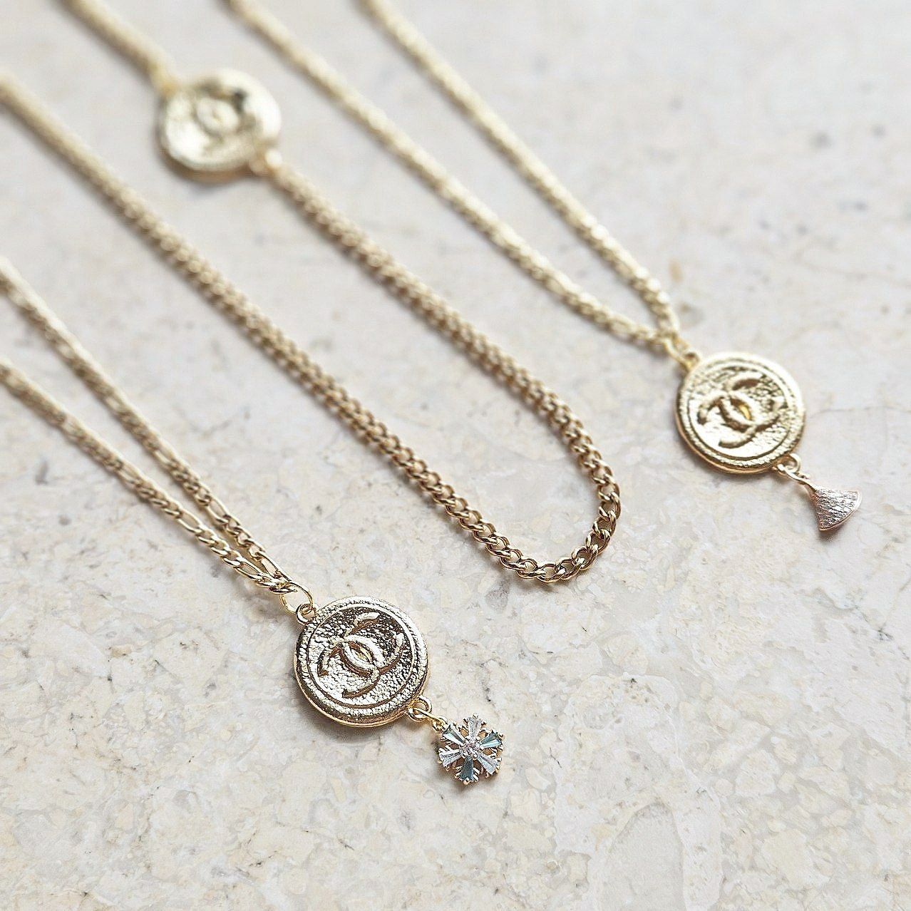 Chanel Vintage Gold Necklace with Snowflake Charm
